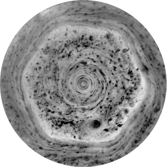 A negative image of Saturns Polar region as taken by the Cassini probe in 2012.